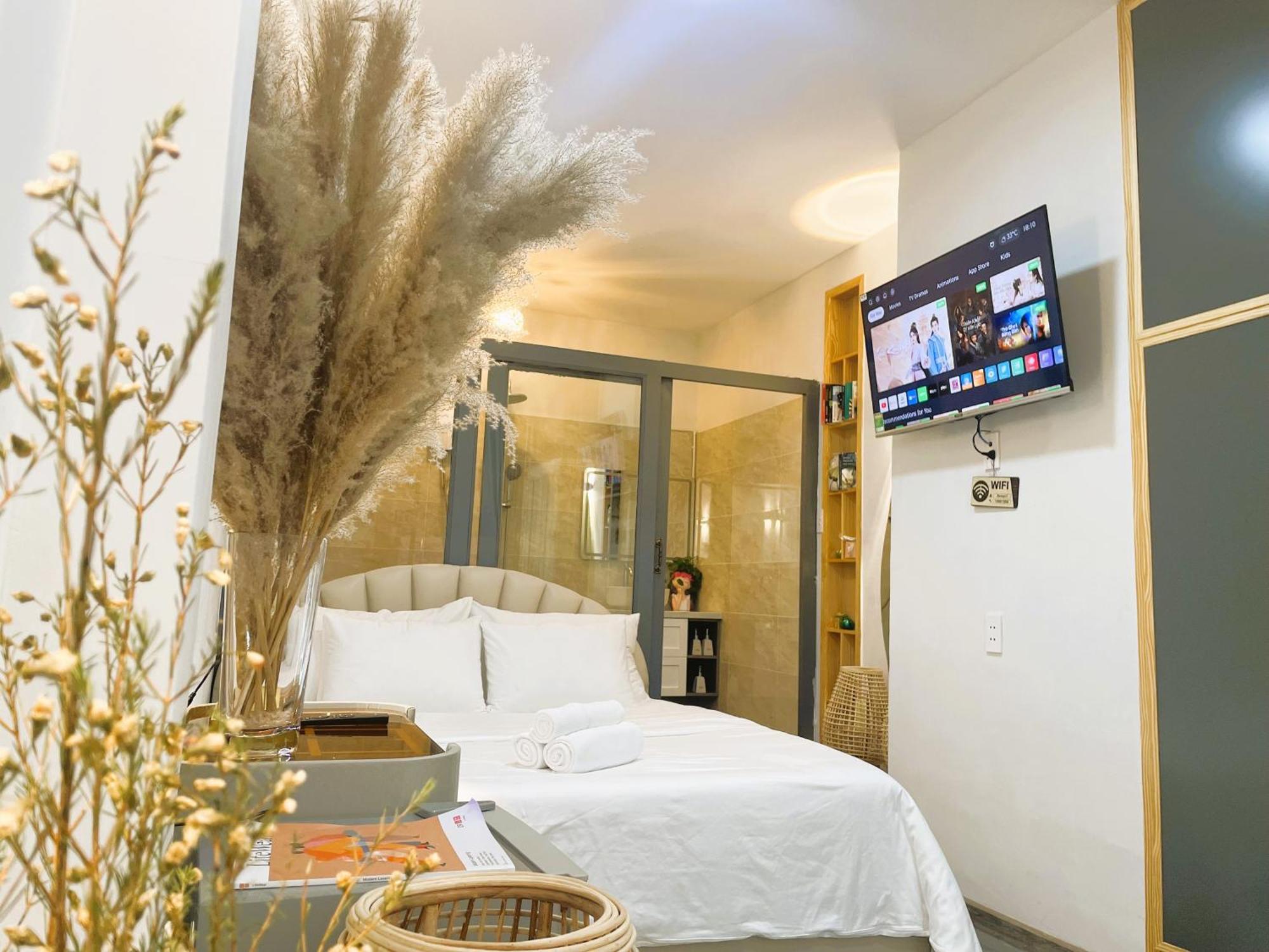 6Even Hotel - Have A Staycation In The Cafe Apartments Building Хошимин Экстерьер фото