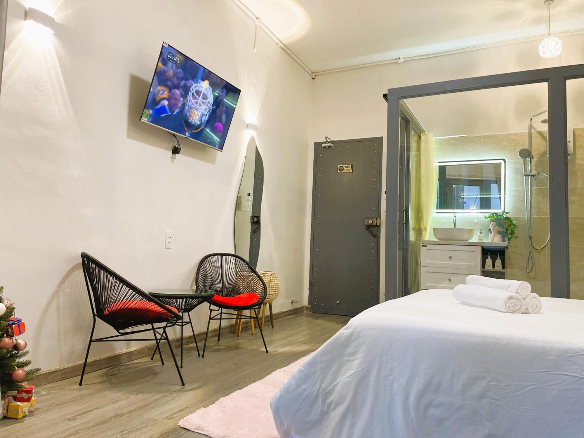 6Even Hotel - Have A Staycation In The Cafe Apartments Building Хошимин Экстерьер фото
