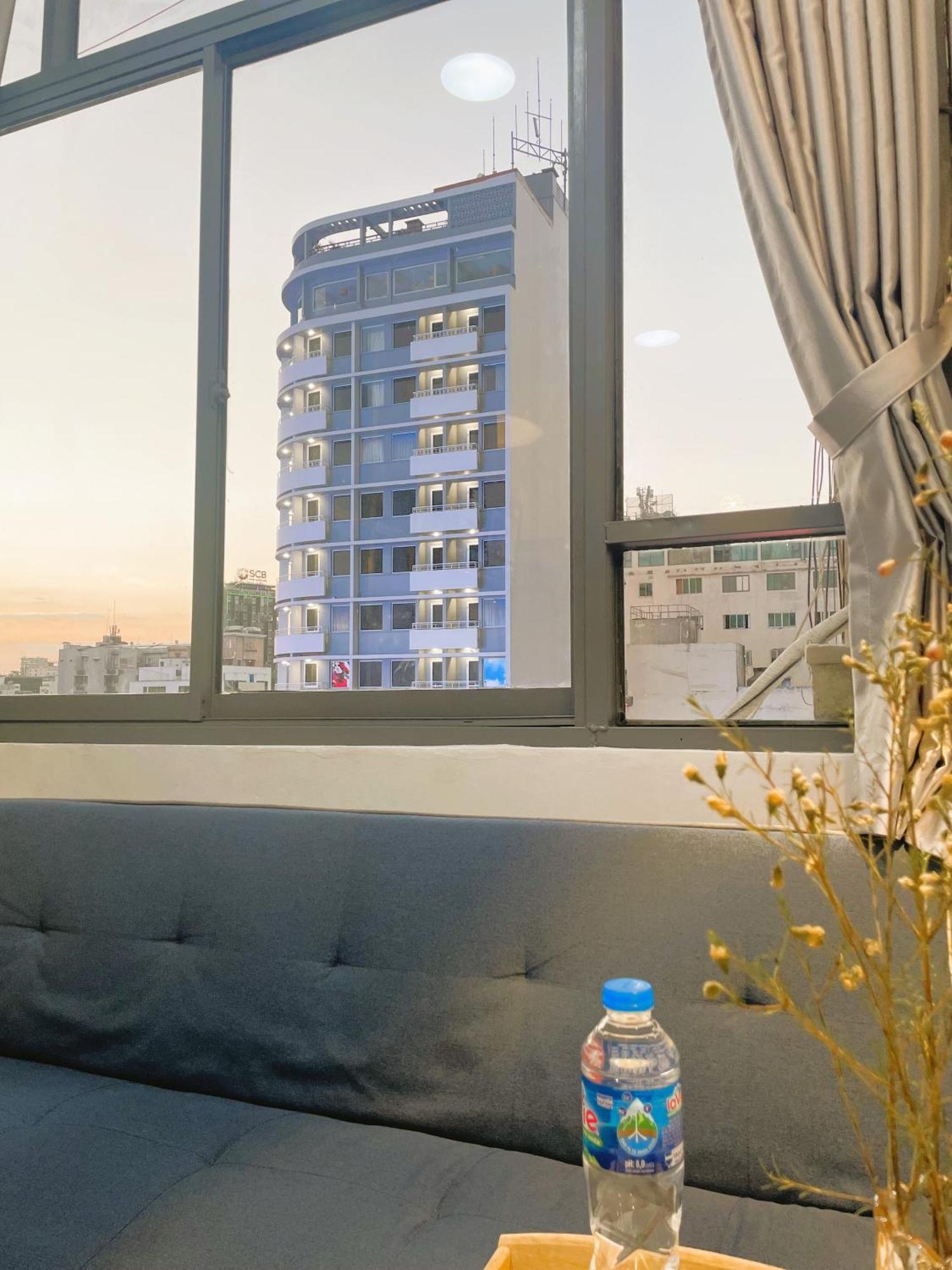 6Even Hotel - Have A Staycation In The Cafe Apartments Building Хошимин Экстерьер фото