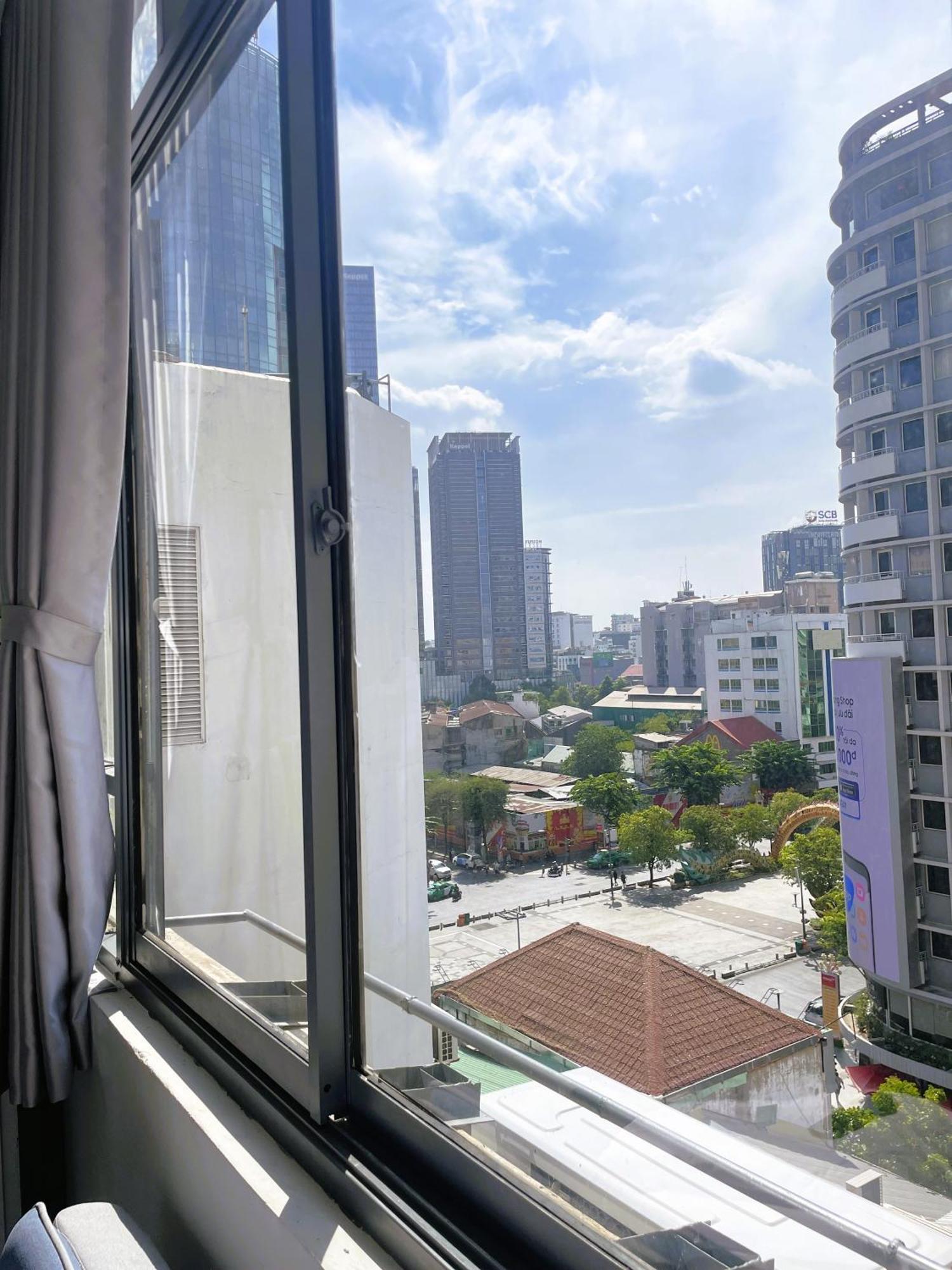 6Even Hotel - Have A Staycation In The Cafe Apartments Building Хошимин Экстерьер фото