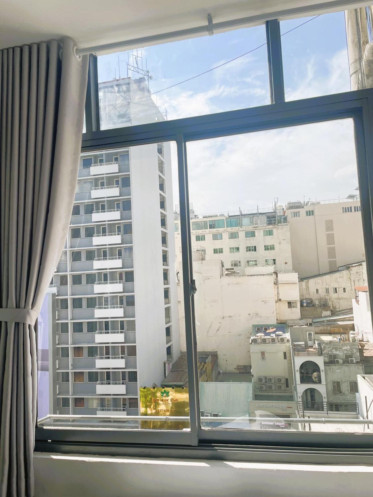 6Even Hotel - Have A Staycation In The Cafe Apartments Building Хошимин Экстерьер фото