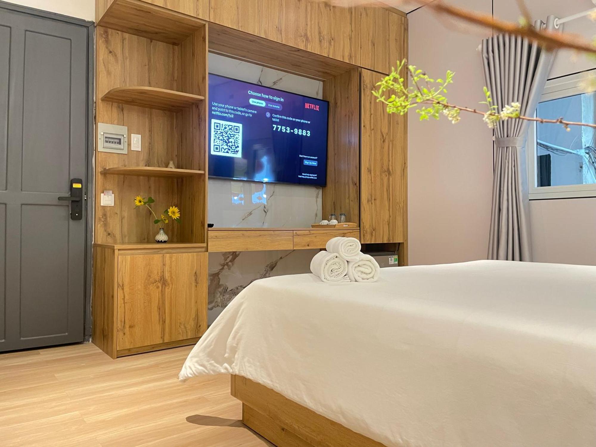 6Even Hotel - Have A Staycation In The Cafe Apartments Building Хошимин Экстерьер фото