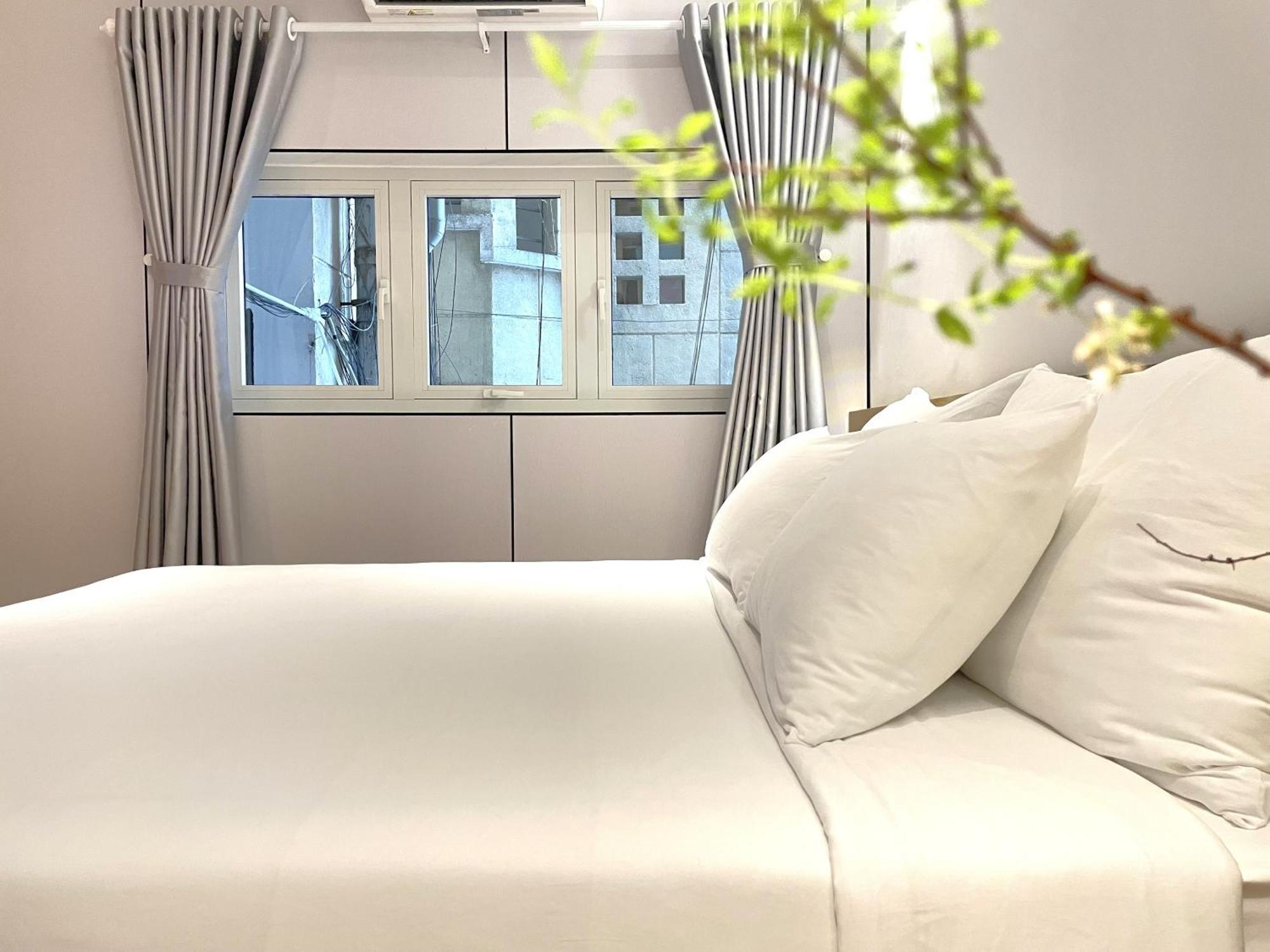 6Even Hotel - Have A Staycation In The Cafe Apartments Building Хошимин Экстерьер фото